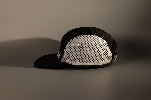 rihla black and white running cap - side of cap