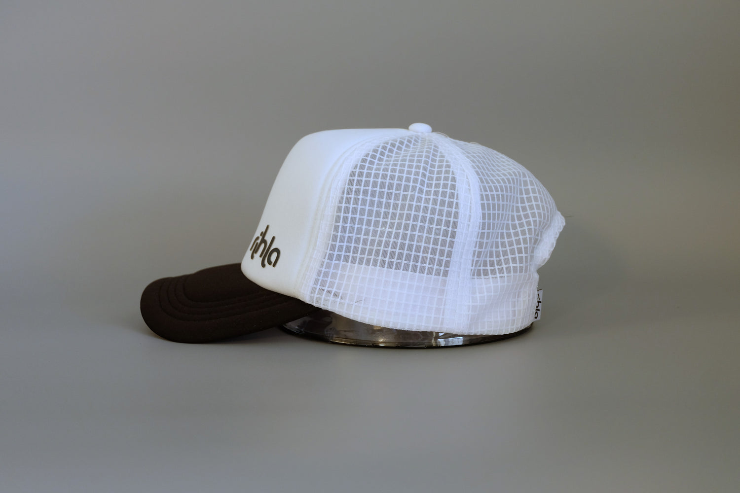 rihla white trucker running cap - side of cap